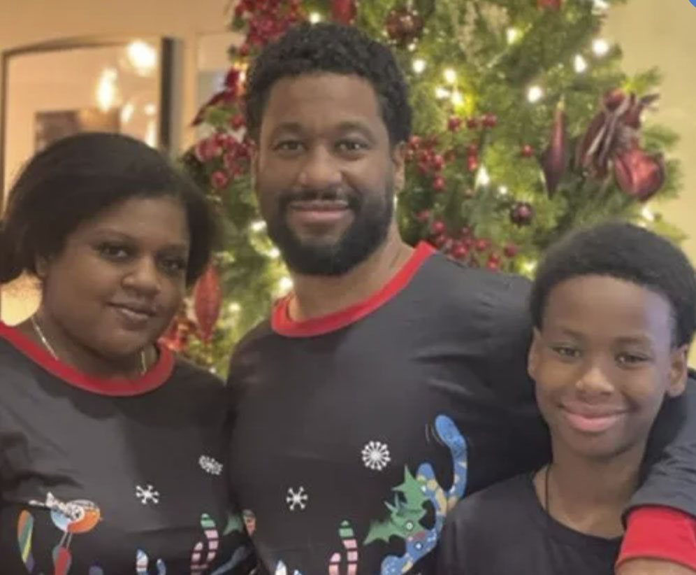 picture of Rashiid N. in front of a house